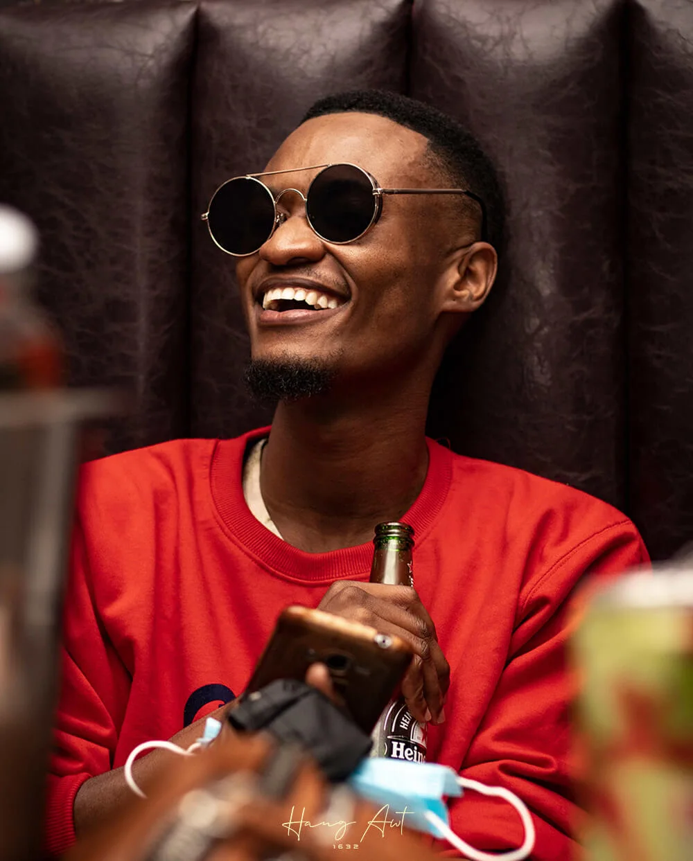 Guest smiling at a Hang Awt social gathering