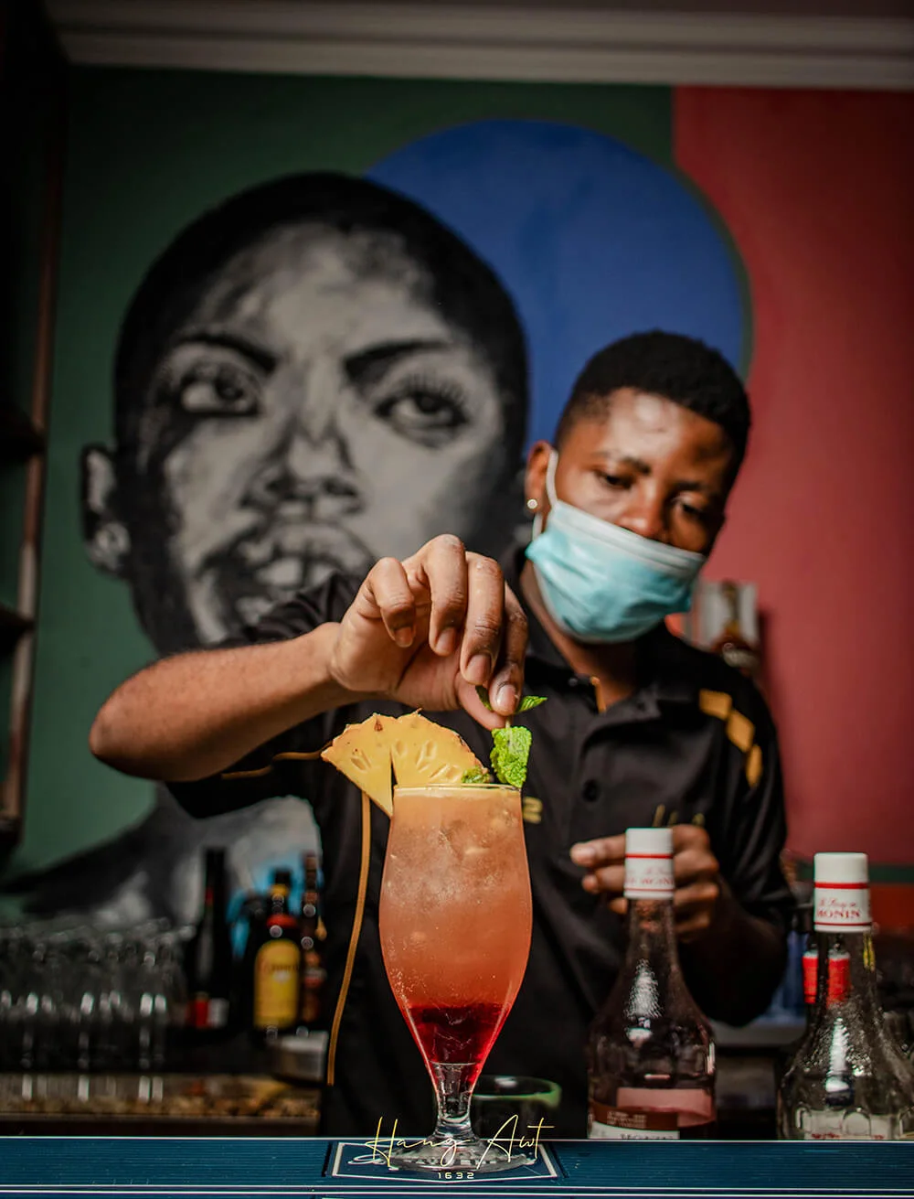 Bartender preparing a cocktail at Hang Awt